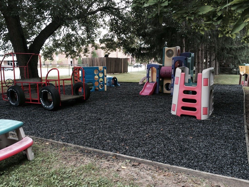 Daycare play area on unpainted rubber mulch