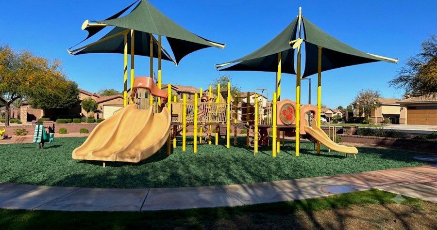 Green rubber mulch at a park playground