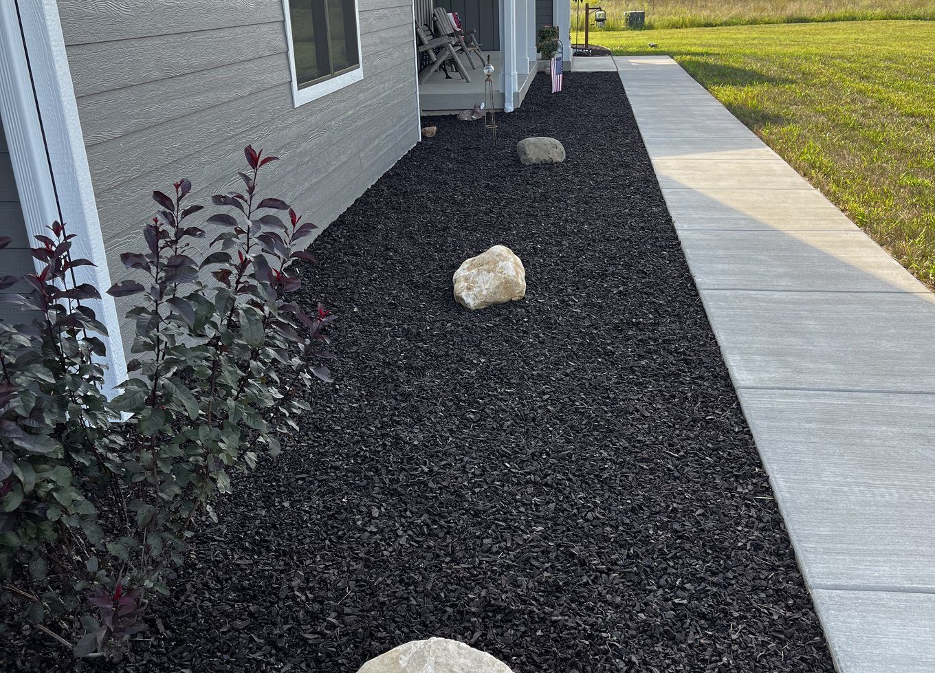 Rubber mulch in a Connecticut landscape bed