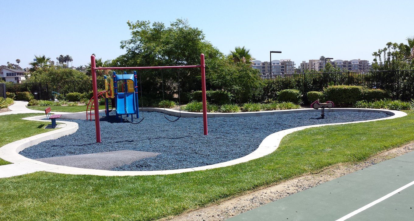 Rubber mulch as a fall surface under park playground equipment