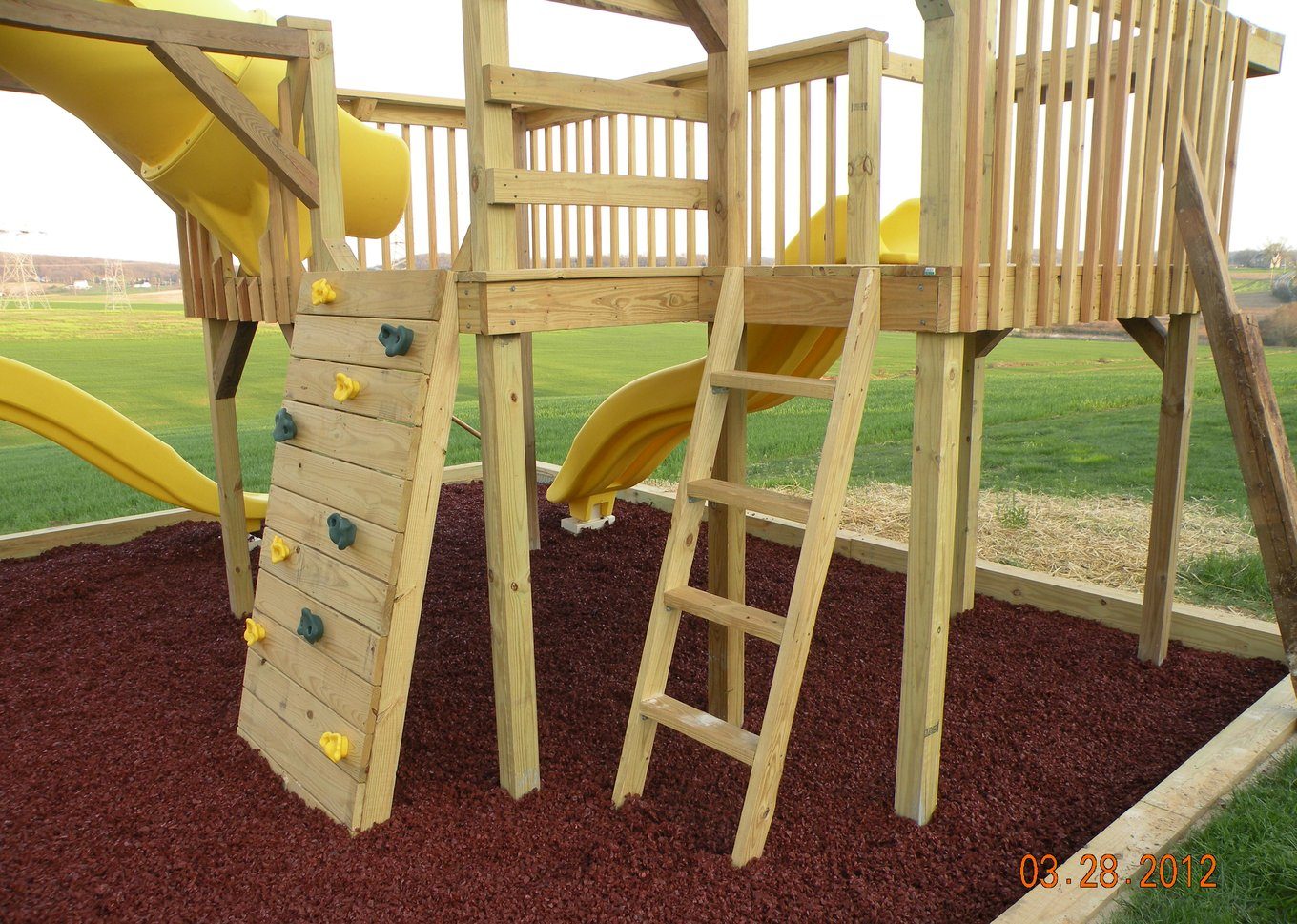 Rubber mulch as a fall surface under park playground equipment