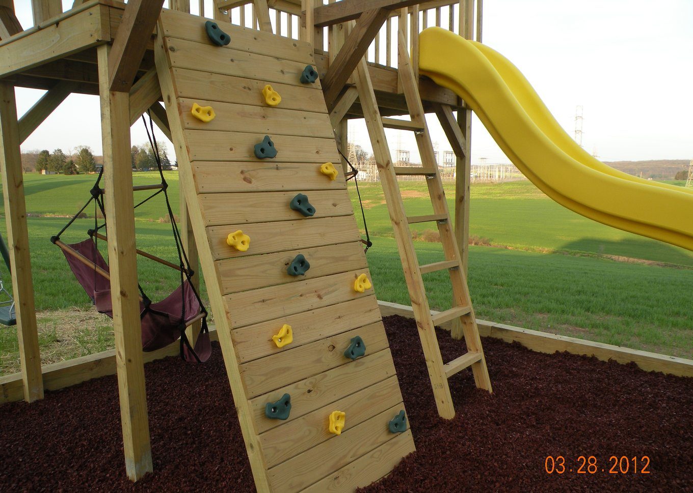 Rubber mulch as a fall surface under park playground equipment